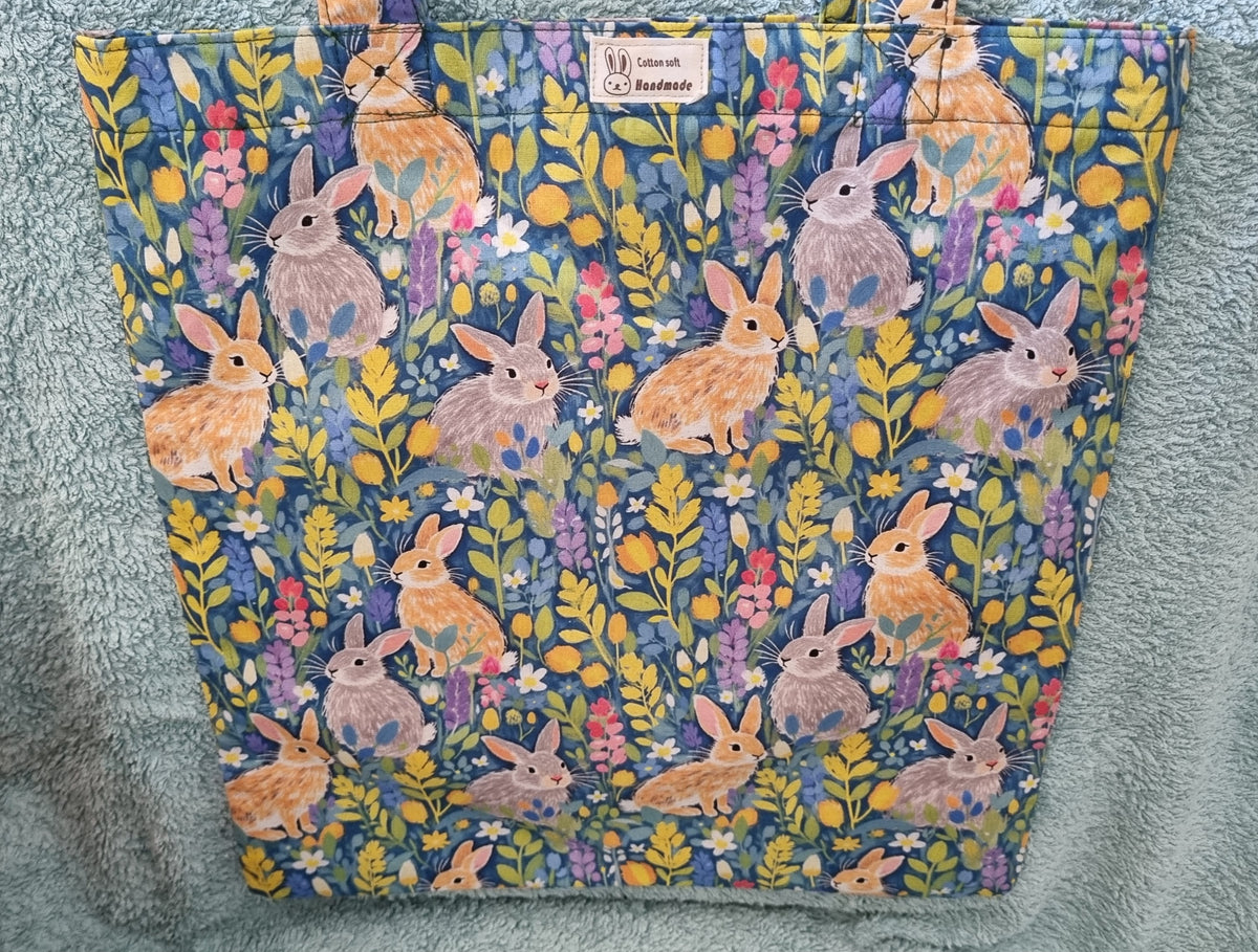 Tote bag and matching framed cosmetic purse set.